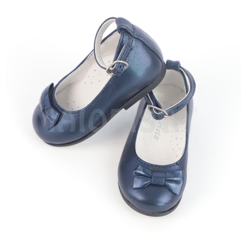 Sapato azul brilhante com laço